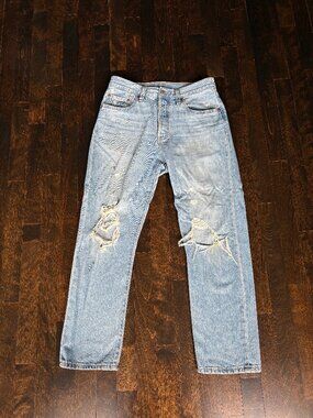 Blue jeans from Levi's with rips on the knees